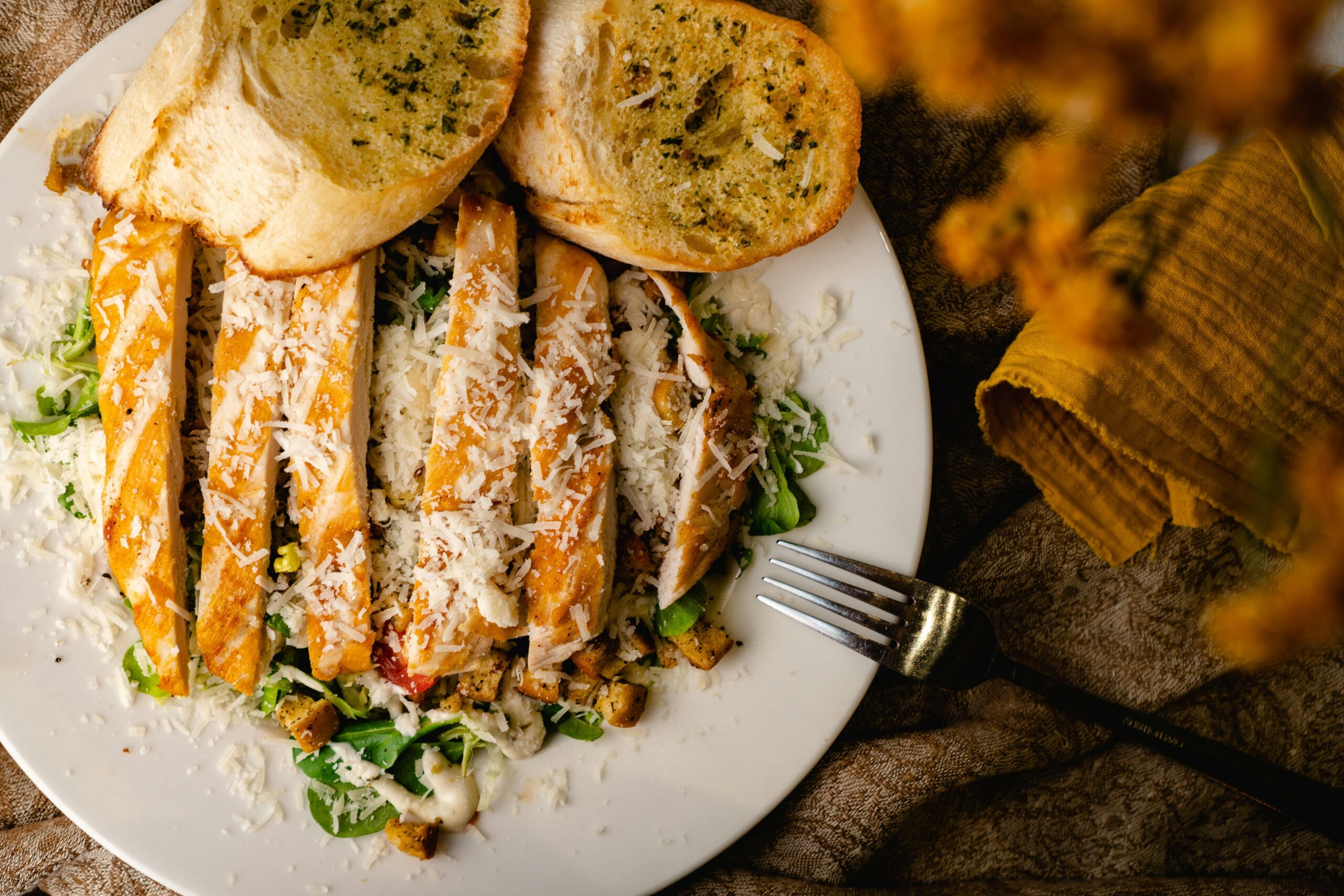 Chicken Caesar Salad with Garlic Bread